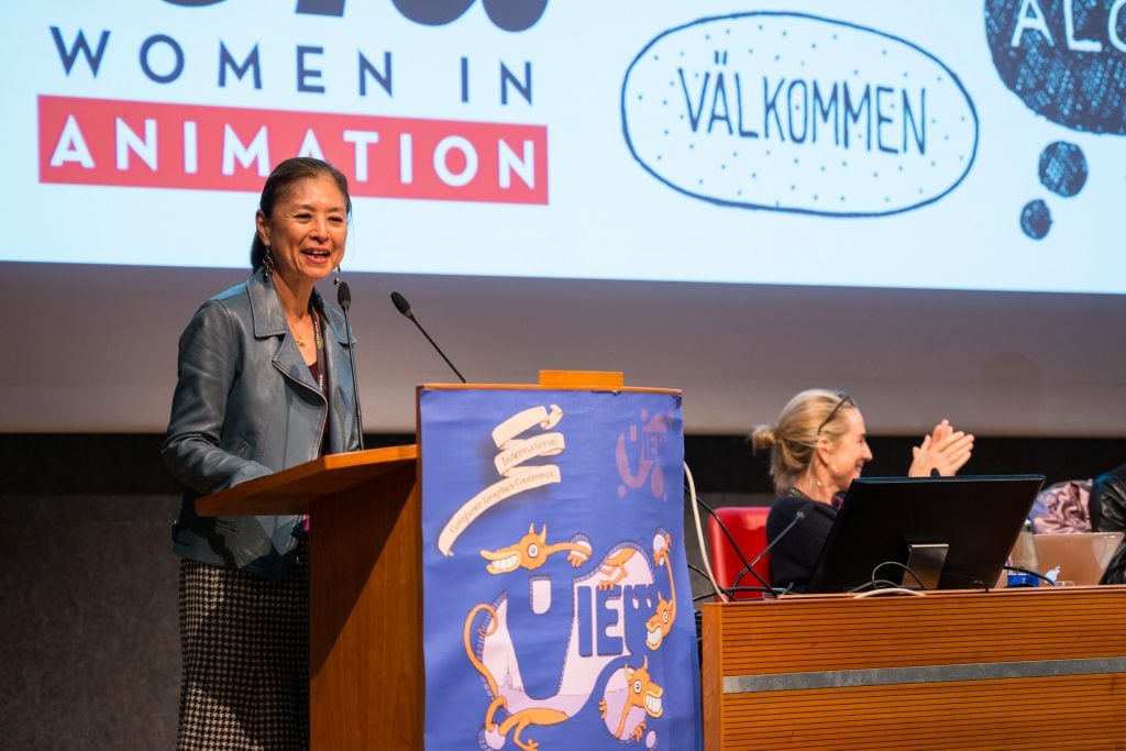 Jinko Gotoh, WIA's Vice President, speaking at an event.